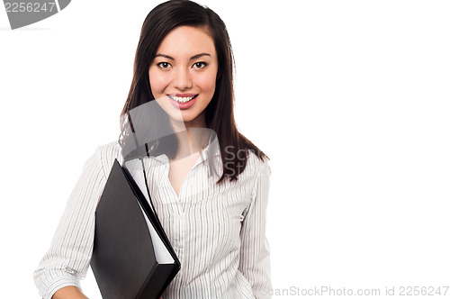 Image of Corporate lady holding business files