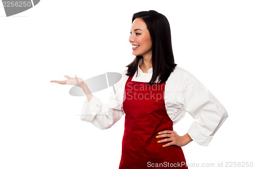 Image of Female chef promoting bakery product