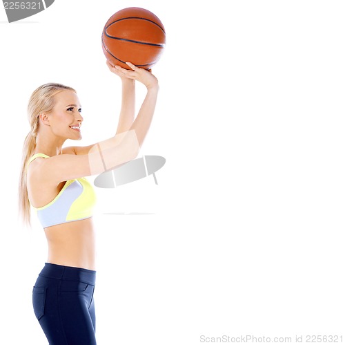 Image of Female basketball player is ready to shoot