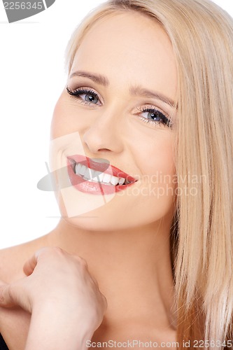 Image of Blond woman with red lipstick smiling