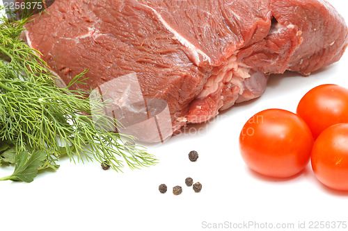 Image of Piece of beef and vegetables on white