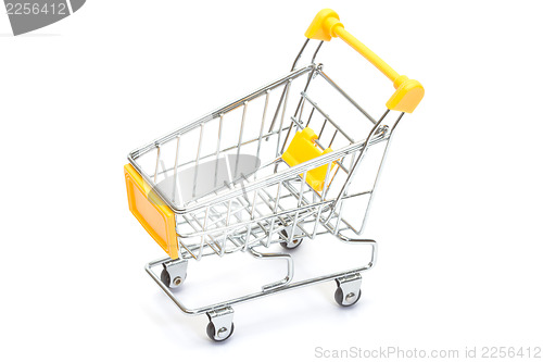 Image of Yellow shopping cart on white