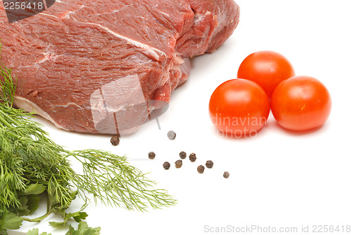 Image of Piece of beef and vegetables on white
