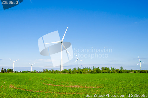 Image of Wind power installation in sunny day 