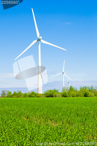 Image of Summer landscape with wind generators  