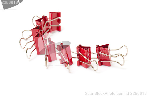 Image of Chain of red paper clips closeup