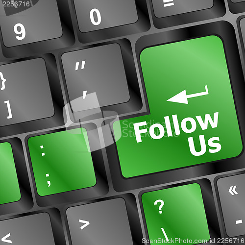 Image of Social media or social network concept: Keyboard with Follow Us button