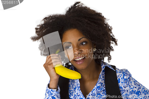 Image of Female afro american with banana