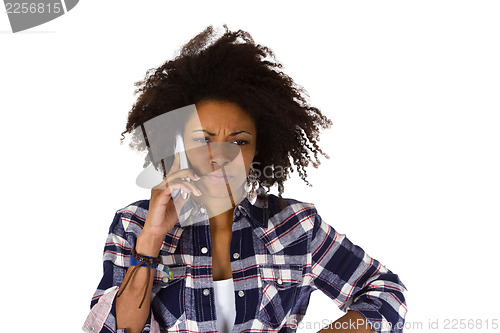 Image of Angry african american woman with cellphone