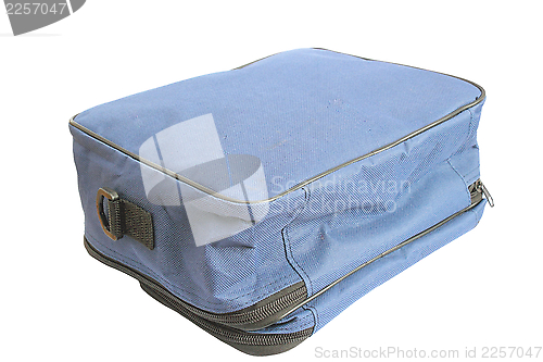 Image of old blue bag over white