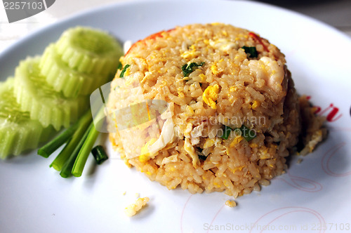 Image of Rice with fried egg and cucumber