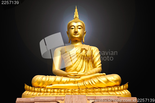 Image of Gold buddha statue on black background