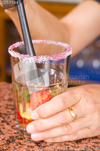 Image of Mixing cocktail ingredients