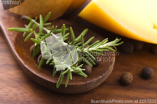 Image of allspice with fresh rosemary, cheese and onion