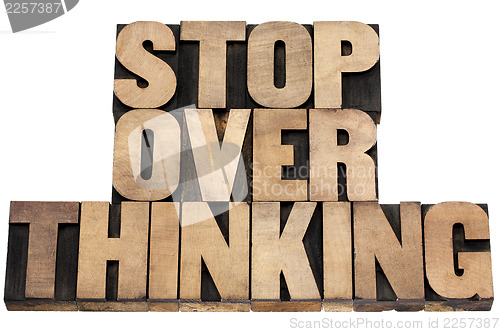 Image of stop overthinking in wood type