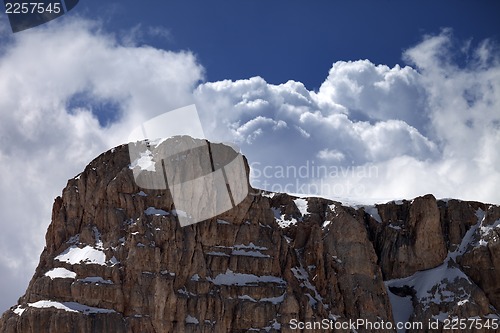 Image of Top of mountain and blue sky with clouds