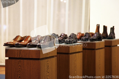 Image of Mens shoes in a store display