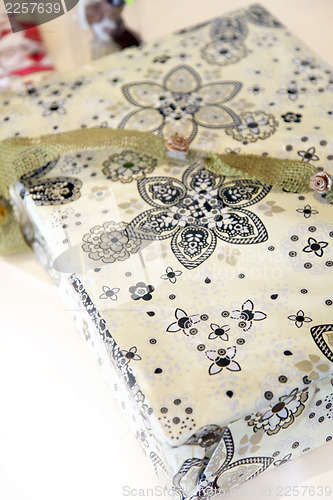 Image of Giftwrapped box with floral paper