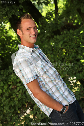 Image of Handsome smiling young man