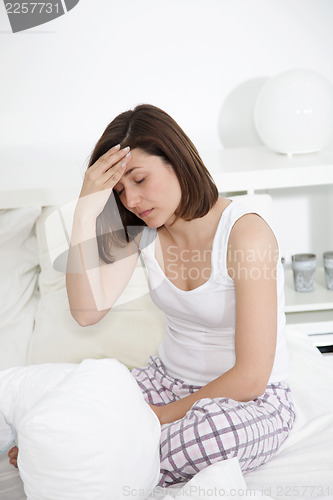 Image of Tired woman with a headache