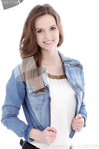 Image of Smiling teenage woman in a denim jacket