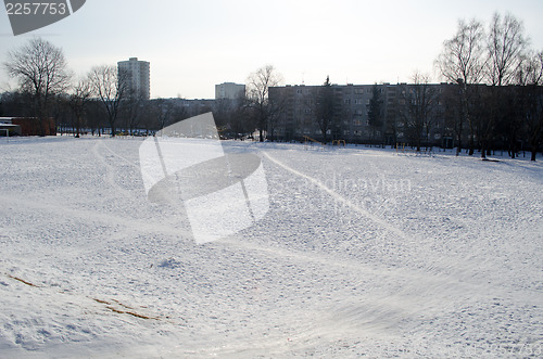 Image of school stadium people and bicycles traces 