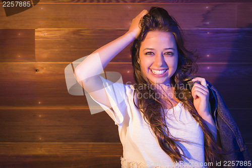 Image of Mixed Race Young Adult Woman Portrait Against Wooden Wall