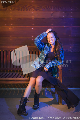 Image of Mixed Race Young Adult Woman Portrait Sitting on Wood Bench