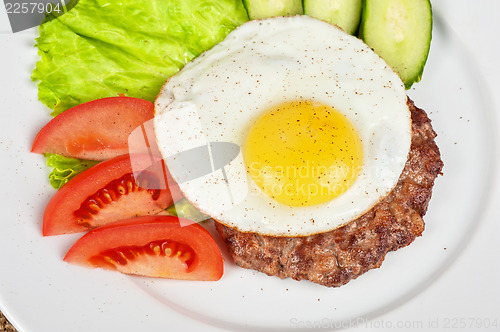 Image of steak beef meat with fried egg