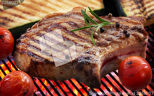 Image of Grilled meat steak and vegetables 