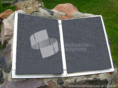 Image of Stone book on front garden