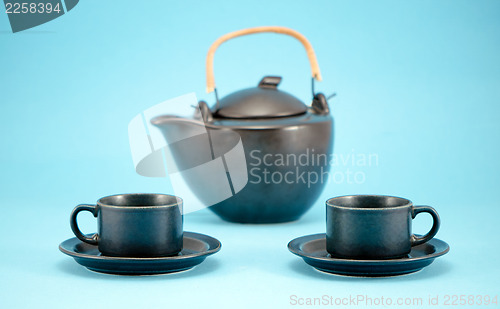 Image of dish retro tea pot cups saucers morning drink blue 