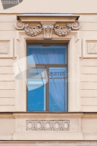 Image of A window with a bas-relief.