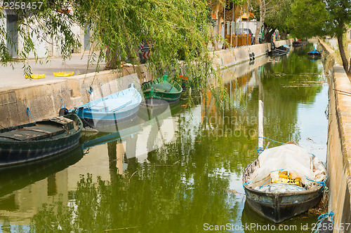 Image of Canal and fishing boats