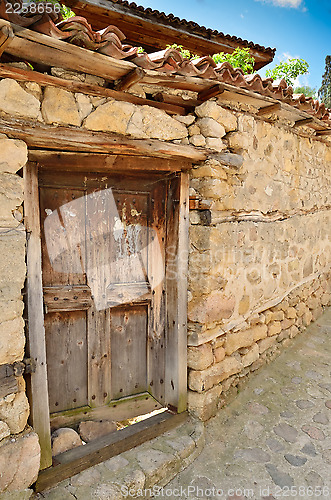 Image of An old wooden door in Koprivshtitsa Bulgaria, from the time of t