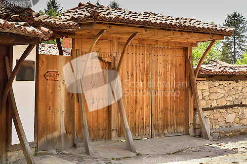 Image of An old wooden door in Koprivshtitsa Bulgaria, from the time of t