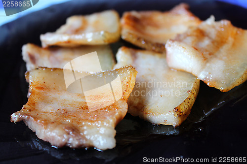 Image of Tasty fried pieces of lard