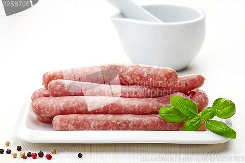 Image of fresh raw minced meat sausages