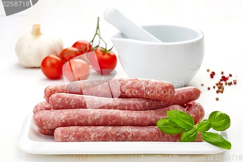 Image of fresh raw minced meat sausages