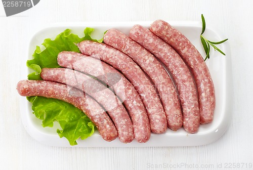 Image of fresh raw minced meat sausages