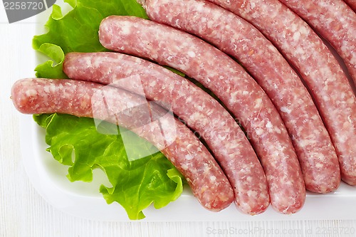 Image of fresh raw minced meat sausages