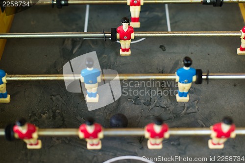 Image of Old and rundown soccer table game