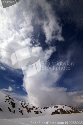 Image of Snow mountains and sky with clouds