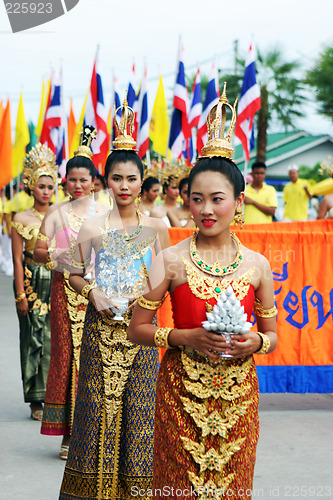 Image of Women in traditional costumes during a parade in Phuket, Thailan