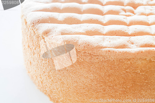 Image of Vanilla sponge cake base for decoration on white background