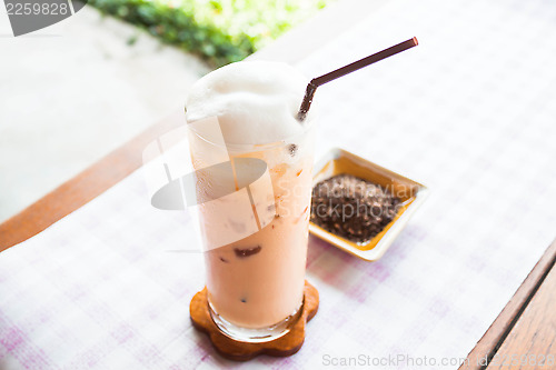 Image of Refreshment glass of cold thai milk tea 