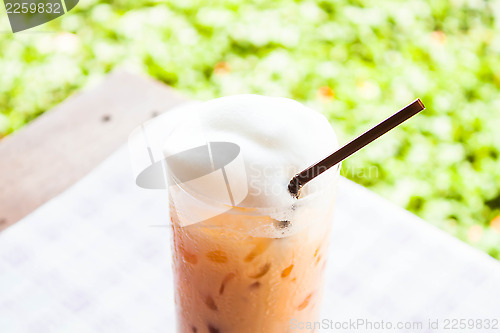 Image of Break time with cold thai milk tea 