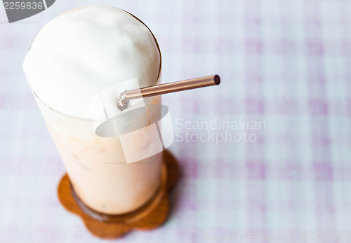 Image of Thai iced tea with milk micro foam