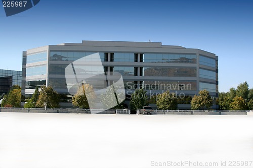 Image of Mirrored Business Building and Parking Lot