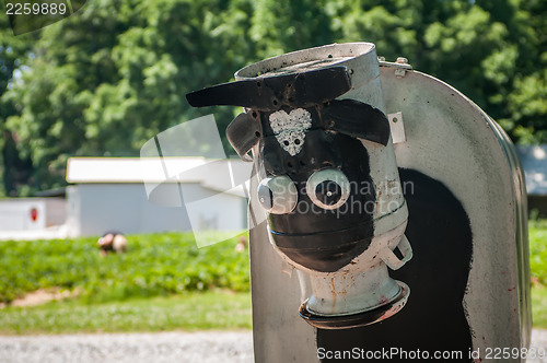 Image of metal cow on farm